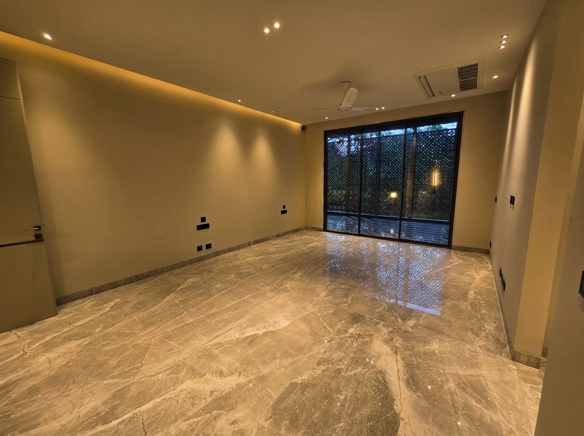 Bedroom with a jali screen balcony at Aalishan, South Extension