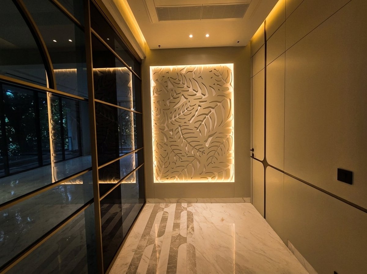 Backlit sculpted art entrance foyer at Aalishan, South Extension