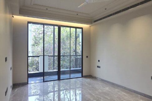 Ekum Homes Bedroom With Marble Flooring And Balcony
