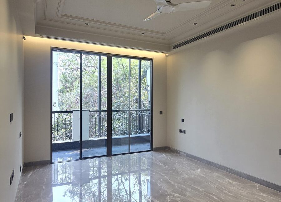 Ekum Homes Bedroom With Marble Flooring And Balcony
