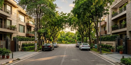 Property in Greater Kailash — luxury builder floors on a tree-lined street in South Delhi