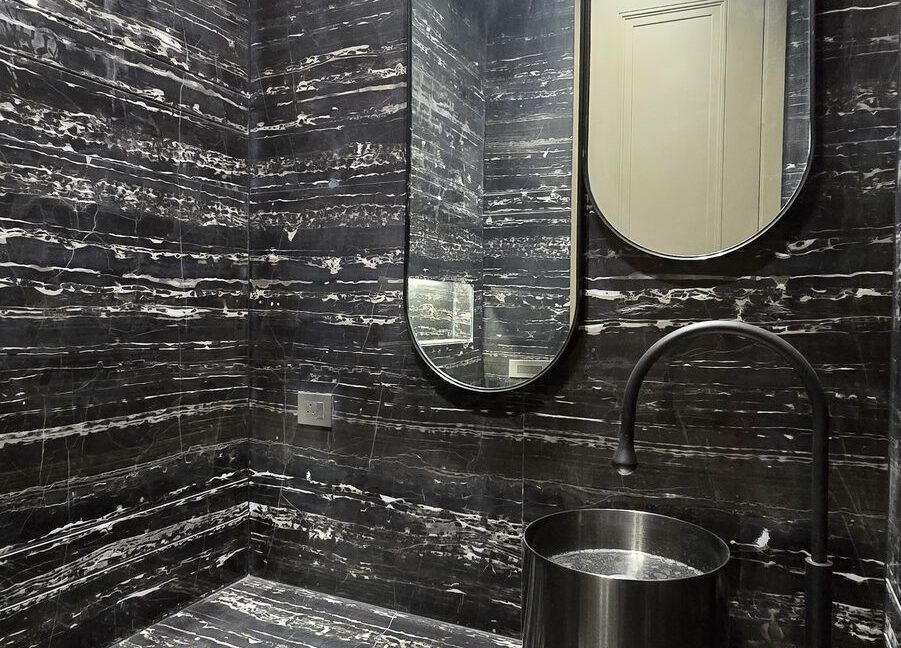 Indus Homes Black Marble Powder Room