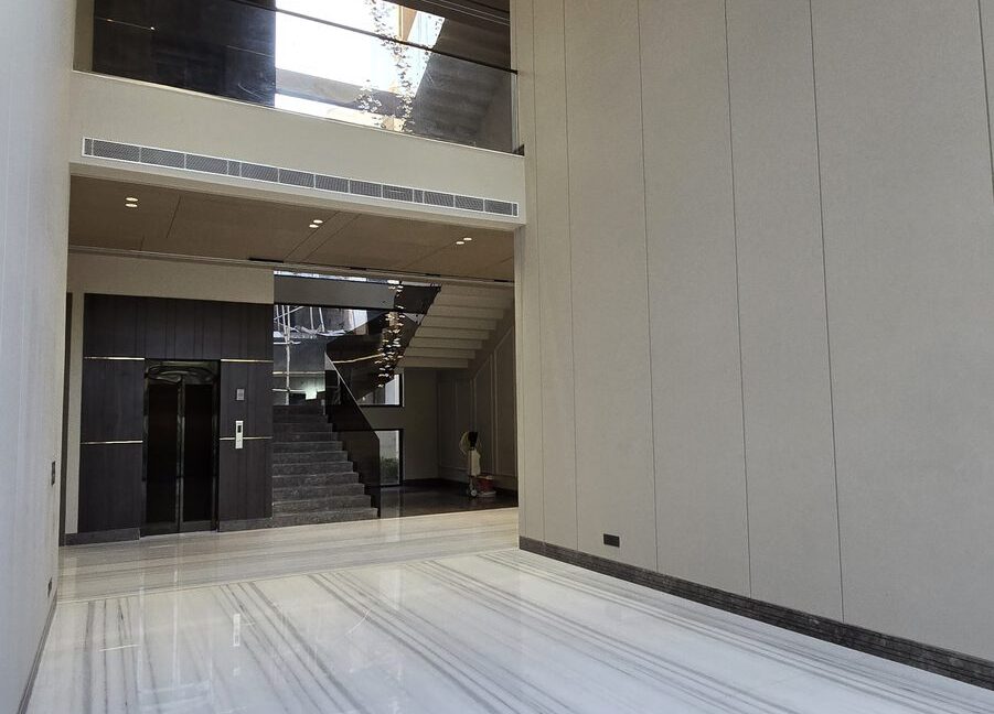 Indus Homes Double Height Lobby And Lift
