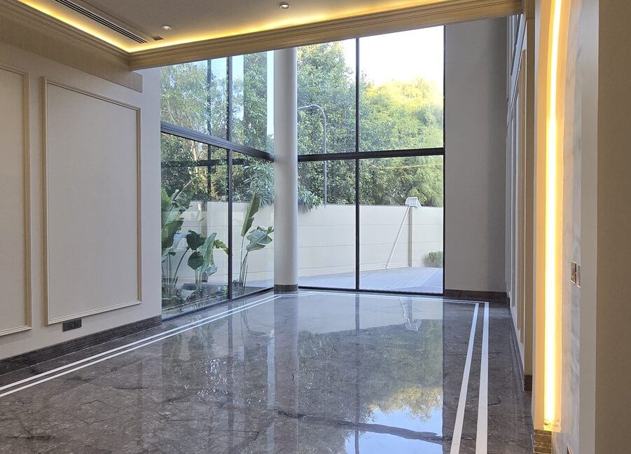 Family Lounge with Grey Marble — Builder Floor in Greater Kailash 2