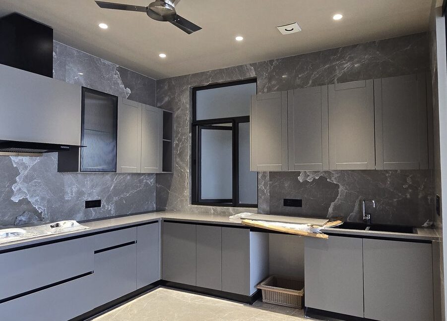 Indus Homes L Shaped Kitchen Grey Marble