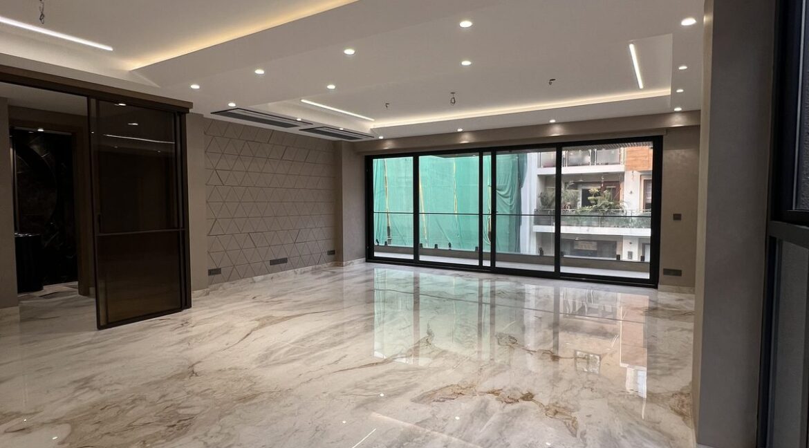 Metro Buildtech Living And Dining With Tinted Glass Doors
