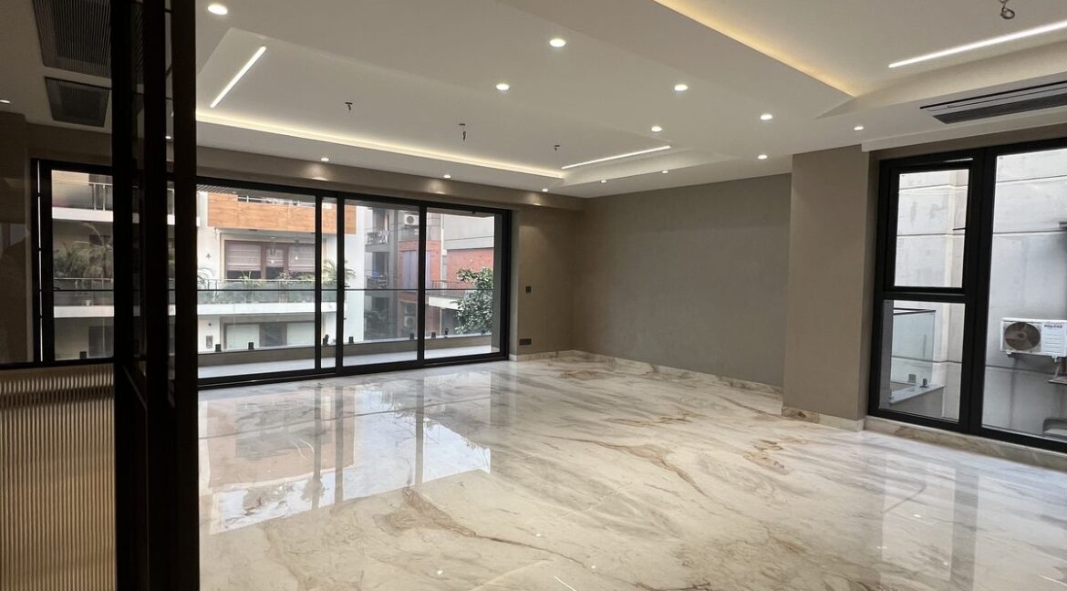 Metro Buildtech Open Living Room With Sliding Windows