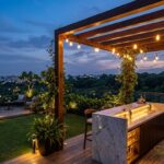 Interconnected terrace garden at dusk with a lit pergola and marble bar in a penthouse in Vasant Vihar, Poorvi Marg, South Delhi