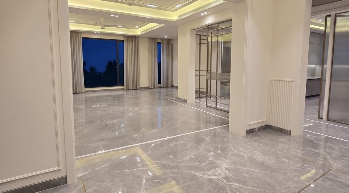 4 BHK in Vasant Vihar – dining room with chandelier