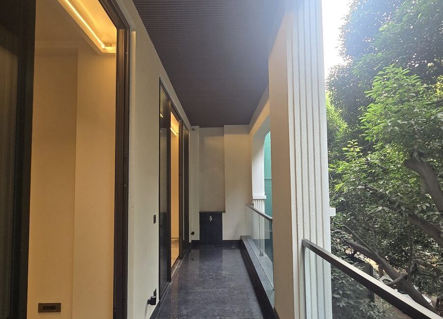 Ekum Homes Balcony With Black Granite Flooring
