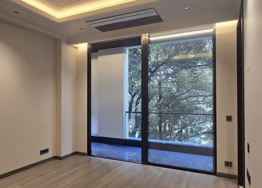 Ekum Homes Bedroom With Tray Ceiling And Tree View