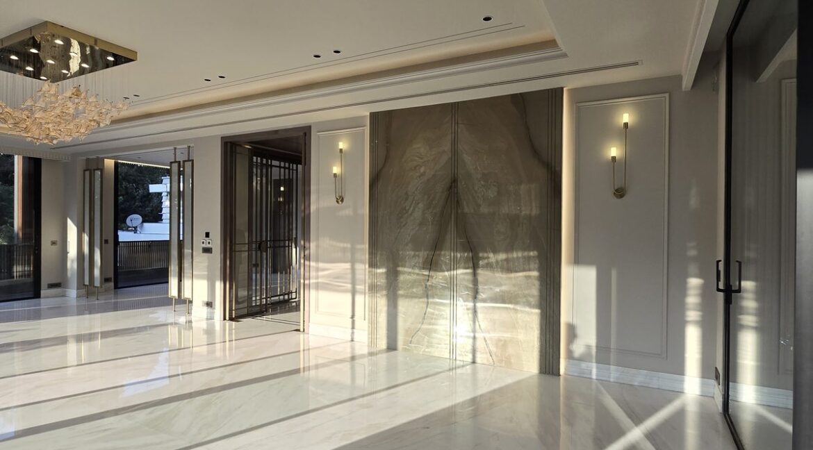 Ekum Homes Drawing Room With Marble Feature Wall
