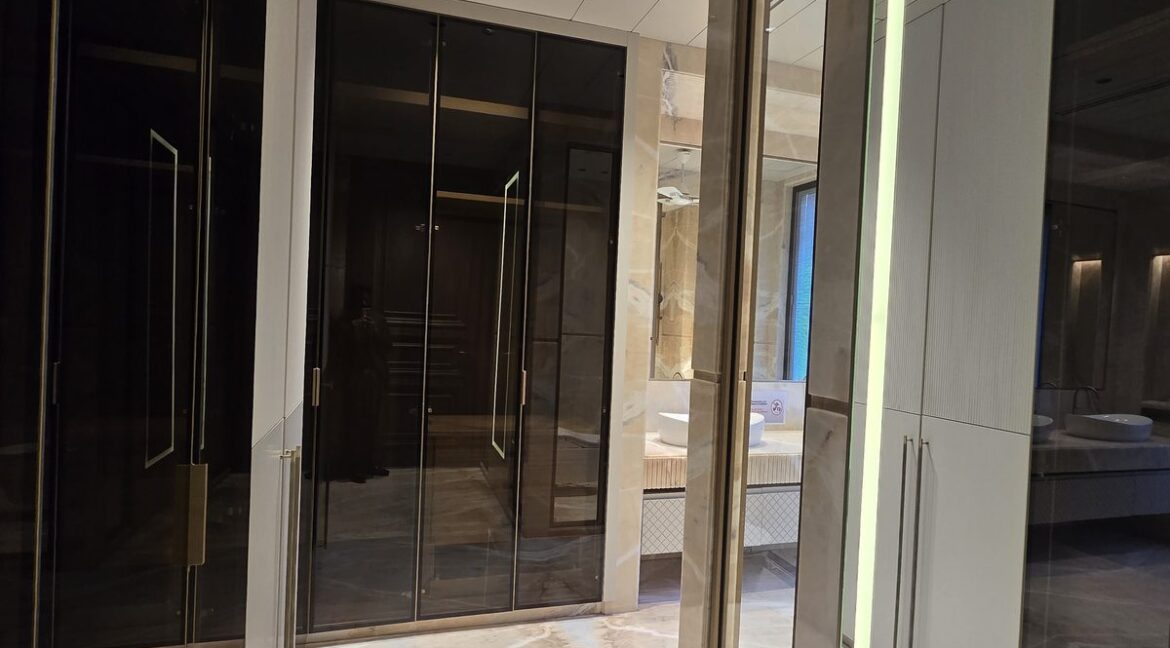 Ekum Homes Dressing Room With Smoked Glass Wardrobes