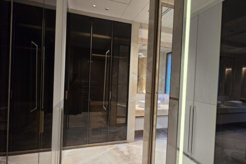Ekum Homes Dressing Room With Smoked Glass Wardrobes
