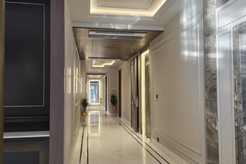 Ekum Homes Entrance Hall With Tumbling-Block Inlay