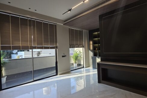 Ekum Homes Family Lounge With TV Wall
