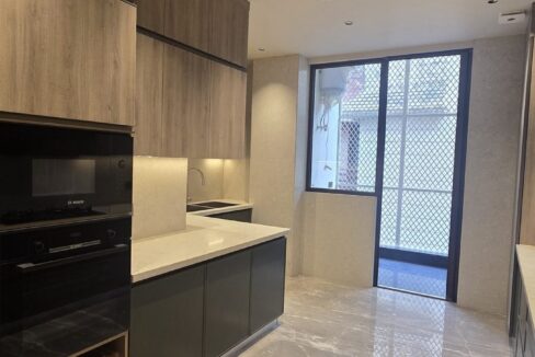 Ekum Homes Kitchen With Built-In Ovens