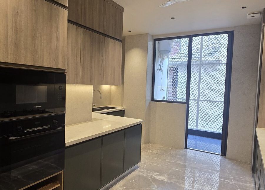 Ekum Homes Kitchen With Built-In Ovens