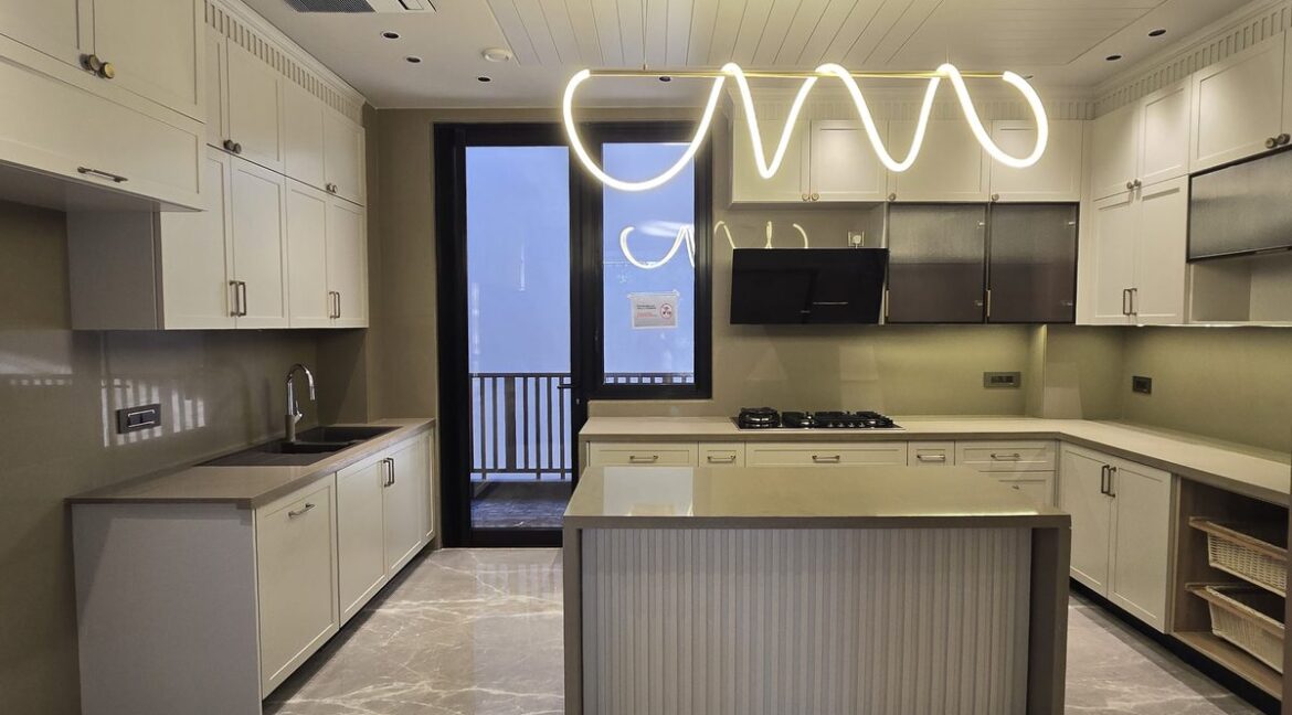 Ekum Homes Kitchen With Spiral LED Pendant