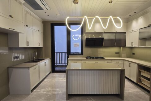 Ekum Homes Kitchen With Spiral LED Pendant