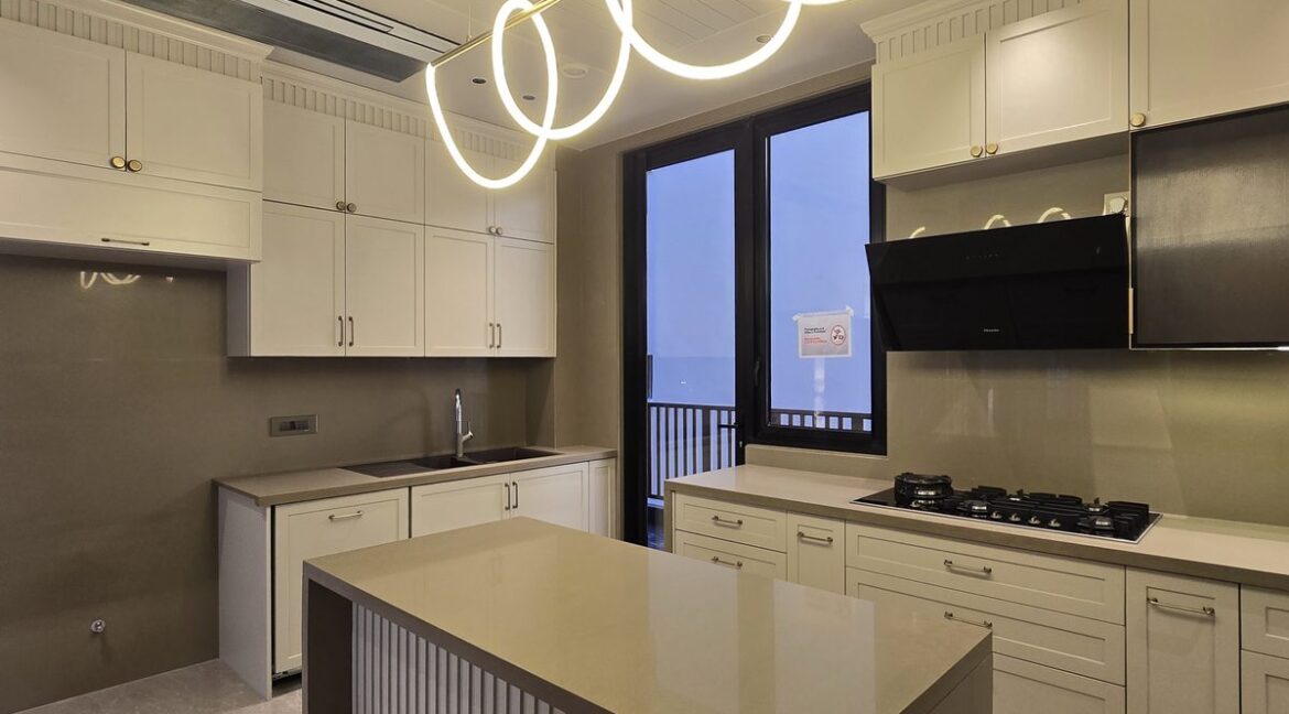 Ekum Homes Kitchen With White Shaker Cabinets