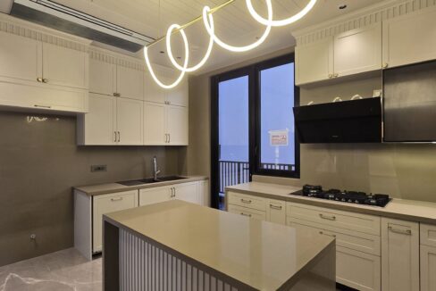 Ekum Homes Kitchen With White Shaker Cabinets
