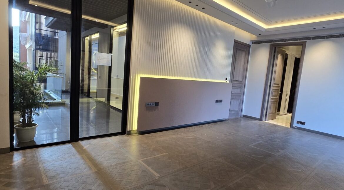 Ekum Homes Living Room With Courtyard Doors