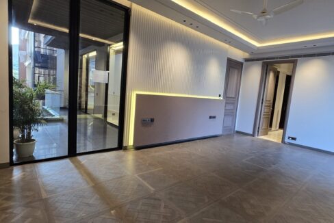 Ekum Homes Living Room With Courtyard Doors