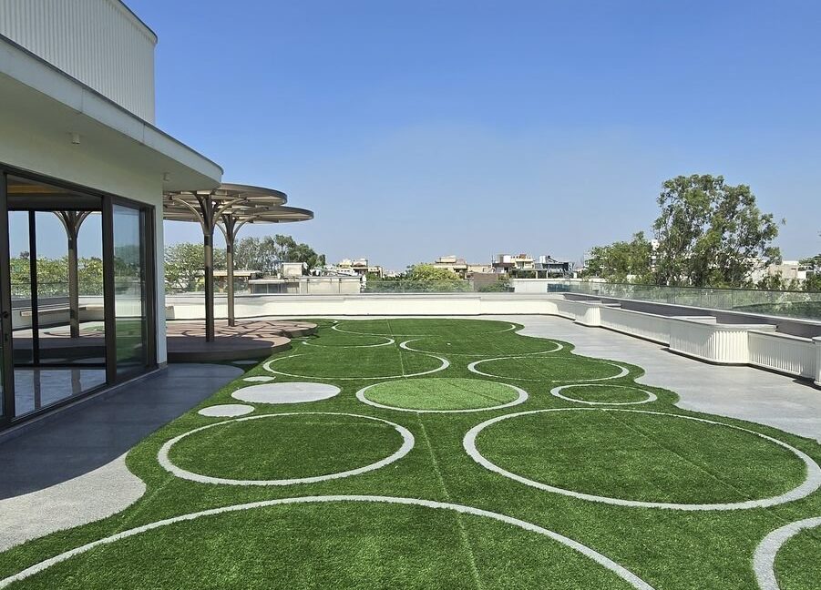 Penthouse in Pamposh Enclave – terrace garden with lawn and rooftop lounge
