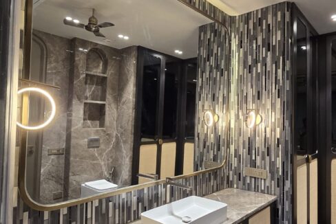 RS Buildtech Bathroom Cane Vanity and Mosaic Tile Wall | Builder Ravinder Singh Marwah