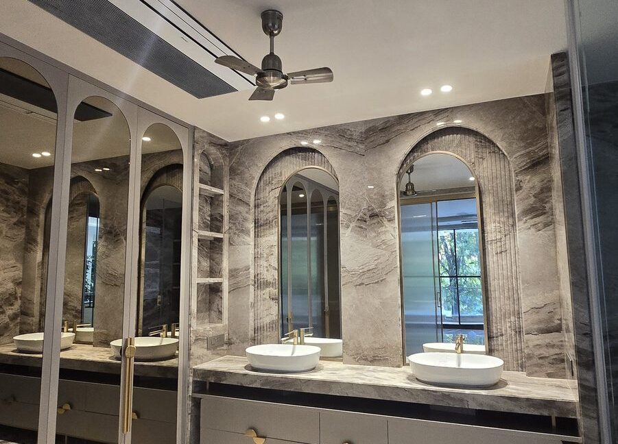 RS Buildtech Bathroom Twin Arched Mirrors in Grey Marble | Luxury Builder Floor by Ravinder Singh Marwah