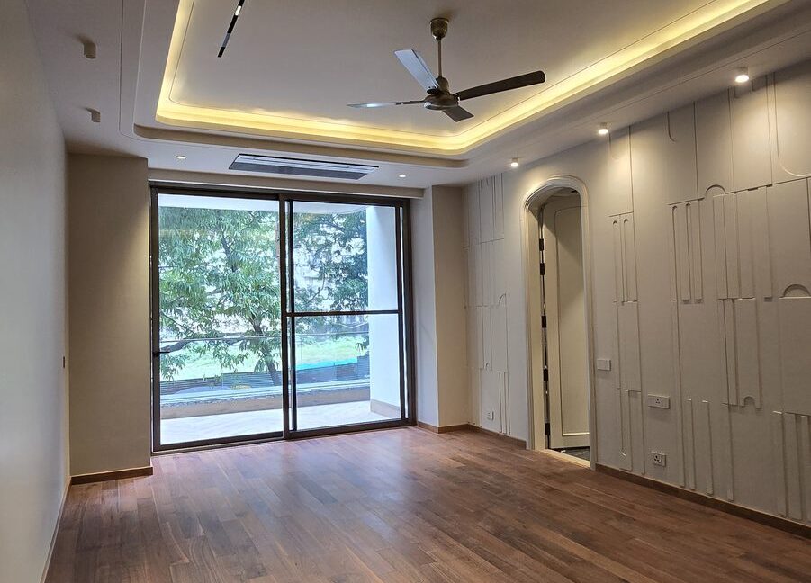 RS Buildtech Bedroom with Walnut Wood Flooring | Builder Ravinder Singh Marwah