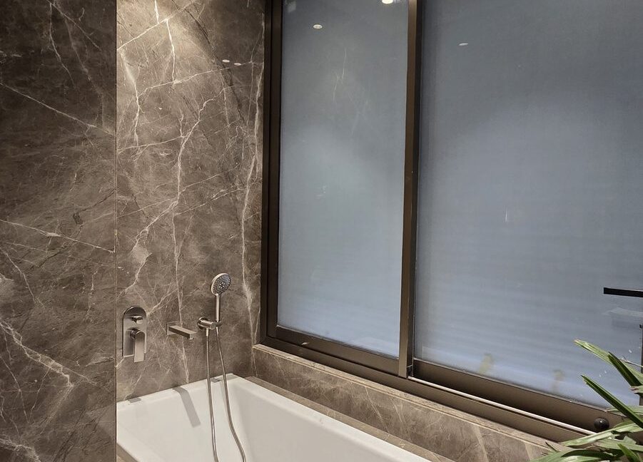 RS Buildtech Built-In Bathtub in Grey Marble | Luxury Property by Ravinder Singh Marwah
