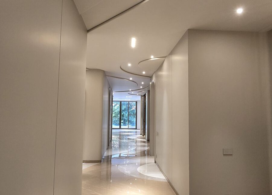 RS Buildtech Curved Corridor with Marble Inlay | Developer Ravinder Singh Marwah