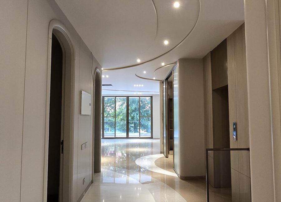 RS Buildtech Curved Lobby with Arched Doorway | Luxury Property by Ravinder Singh Marwah