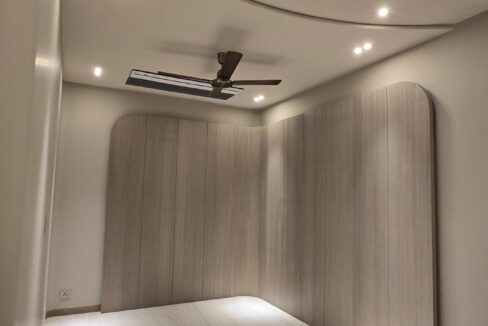 RS Buildtech Curved Wood-Panelled Alcove | Luxury Builder Floor by Ravinder Singh Marwah