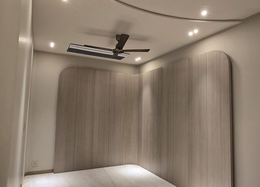 RS Buildtech Curved Wood-Panelled Alcove | Luxury Builder Floor by Ravinder Singh Marwah