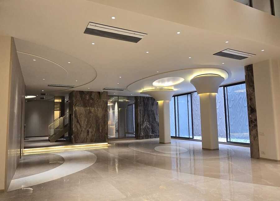 RS Buildtech Double-Height Lounge with Glass Gallery | Builder Ravinder Singh Marwah