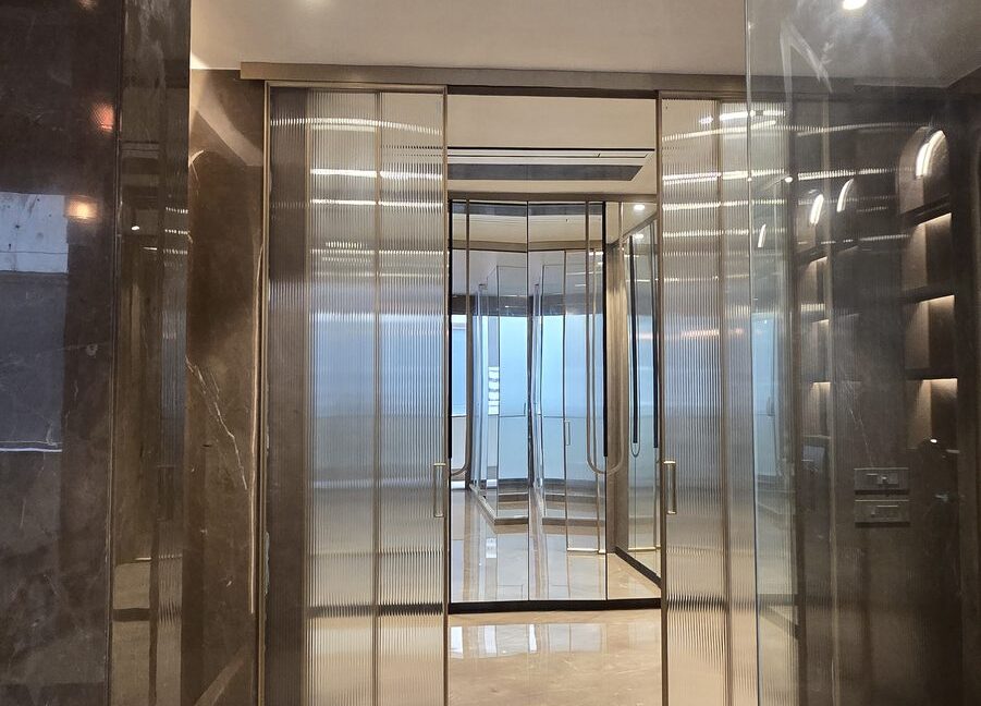 RS Buildtech Fluted Glass Sliding Doors to Bathroom Suite | Developer Ravinder Singh Marwah