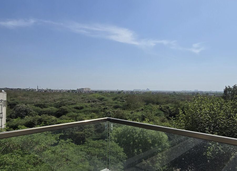 RS Buildtech Glass Balustrade with Panoramic Green Views | Builder Ravinder Singh Marwah