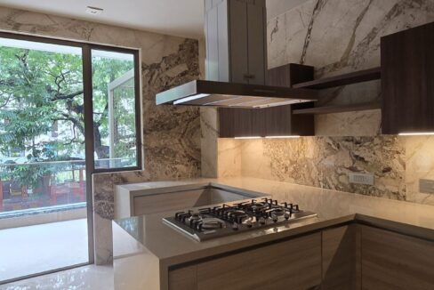 RS Buildtech Kitchen with Marble Backsplash | Builder Ravinder Singh Marwah