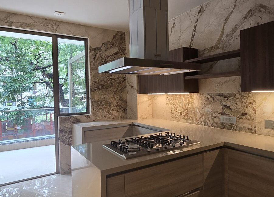 RS Buildtech Kitchen with Marble Backsplash | Builder Ravinder Singh Marwah