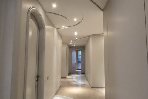 RS Buildtech Long Corridor with Arched Doors | Developer Ravinder Singh Marwah