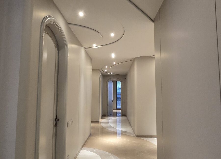 RS Buildtech Long Corridor with Arched Doors | Developer Ravinder Singh Marwah