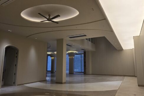RS Buildtech Open-Plan Hall with Circular Floor Inlay | Luxury Builder Floor by Ravinder Singh Marwah