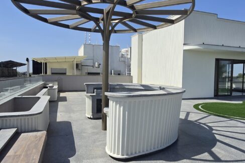 RS Buildtech Outdoor Bar Counter under Umbrella Pergola | Developer Ravinder Singh Marwah