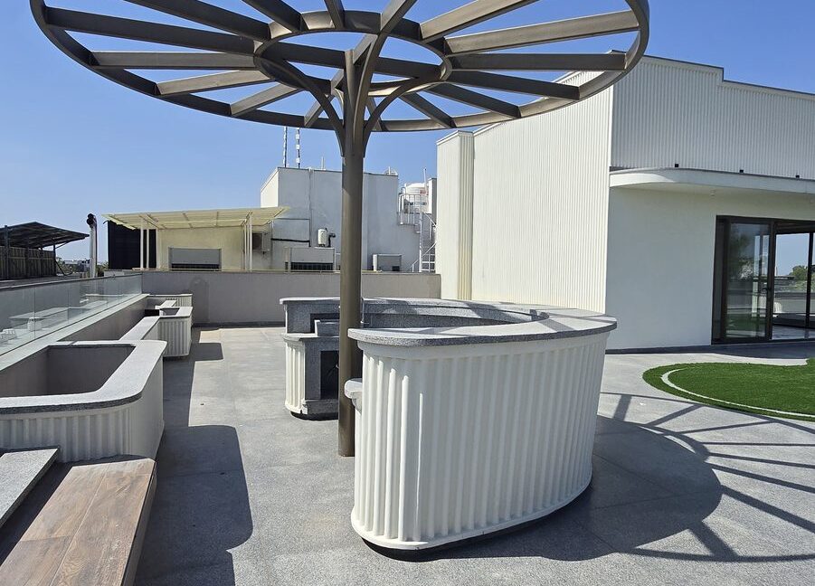 RS Buildtech Outdoor Bar Counter under Umbrella Pergola | Developer Ravinder Singh Marwah