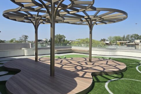 RS Buildtech Pergola Cluster over Curved Wooden Deck | Luxury Builder Floor by Ravinder Singh Marwah