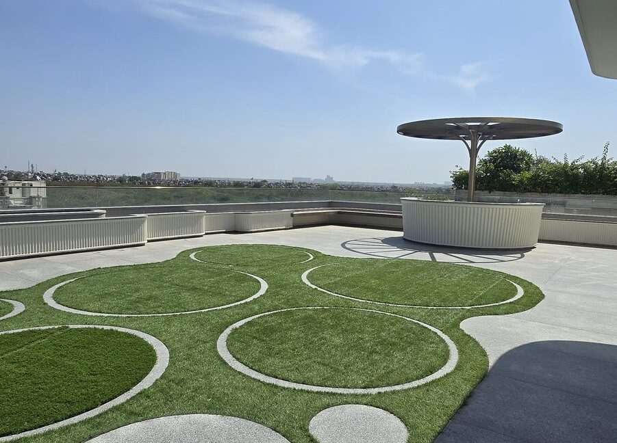 RS Buildtech Rooftop Lawn with Granite Disc Inlays | Builder Ravinder Singh Marwah