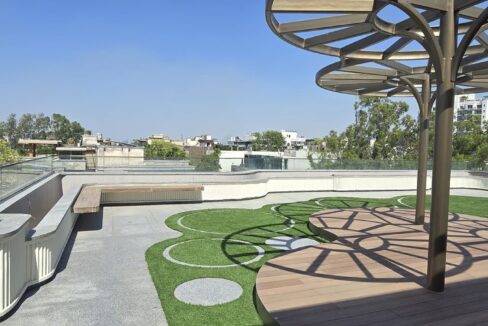 RS Buildtech Rooftop Terrace with Umbrella Pergolas | Luxury Builder Floor by Ravinder Singh Marwah
